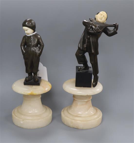 After Lemo, two bronze and ivory figures of a boy playing a lute and a boy in sallopettes tallest 19cm